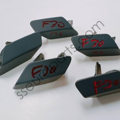 Front M Bumper Left Headlight Washer Cover Part number: 51118056613 8056613 Genuine OEM (secondhand)