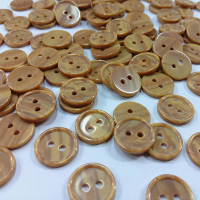 กระดุมลายไม้2รู 11.5มิล (100 เม็ด)