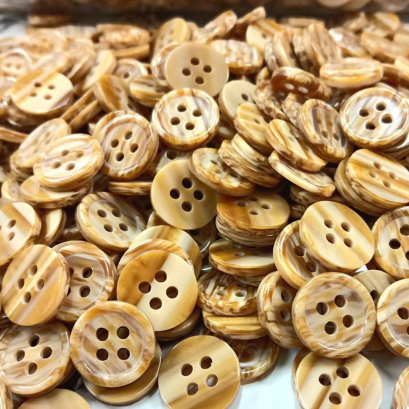 กระดุมลายไม้   11.5 มิล (100เม็ด)