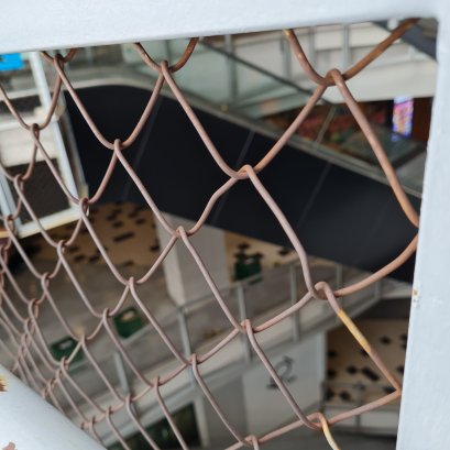 Rusted on the steel wire mesh balaustrade