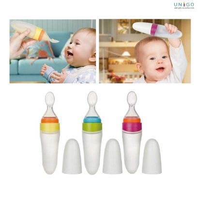 Squeeze feeding spoon