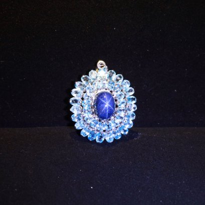&quot;Tanusorn Natural Star Sapphire 16.9 carat 11.4x15.9 mmpendant Adorned with Blue ZirconGemstone