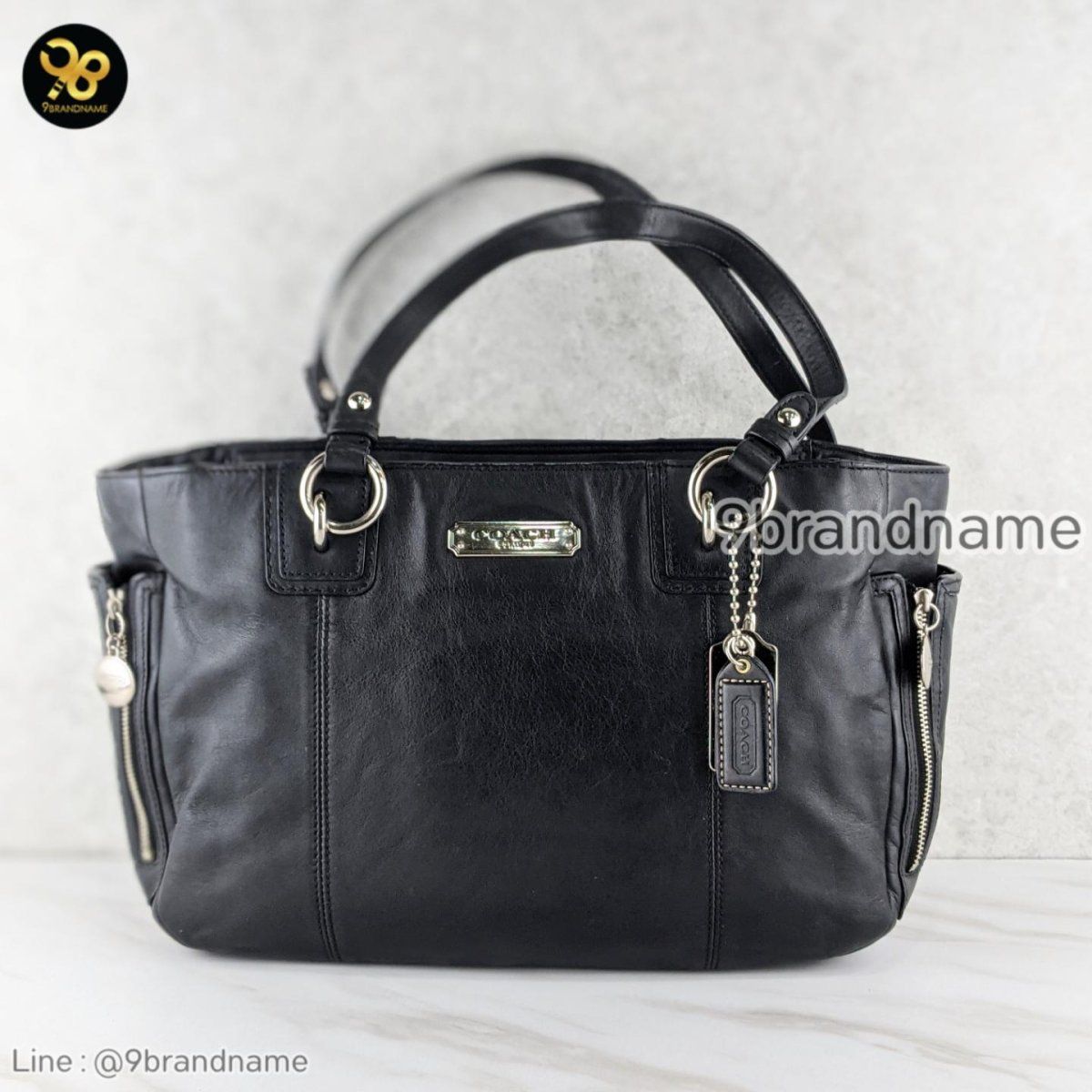 Coach black shiny purse on sale
