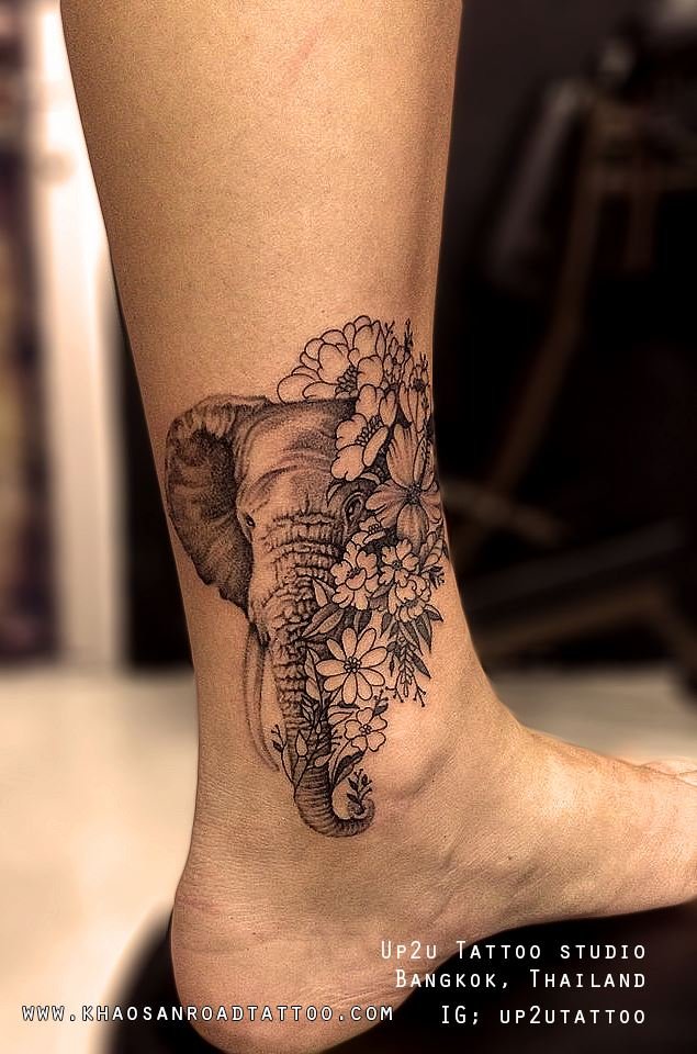 Elephant with flowers Tattoo Elephant with flowers Tattoo