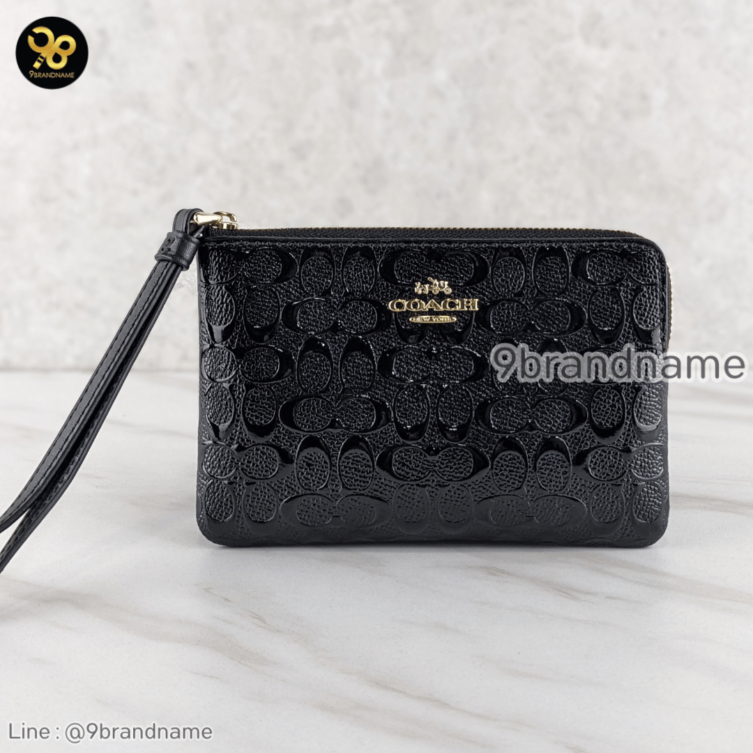 Coach Corner zip wristlet in signature debossed patent leather