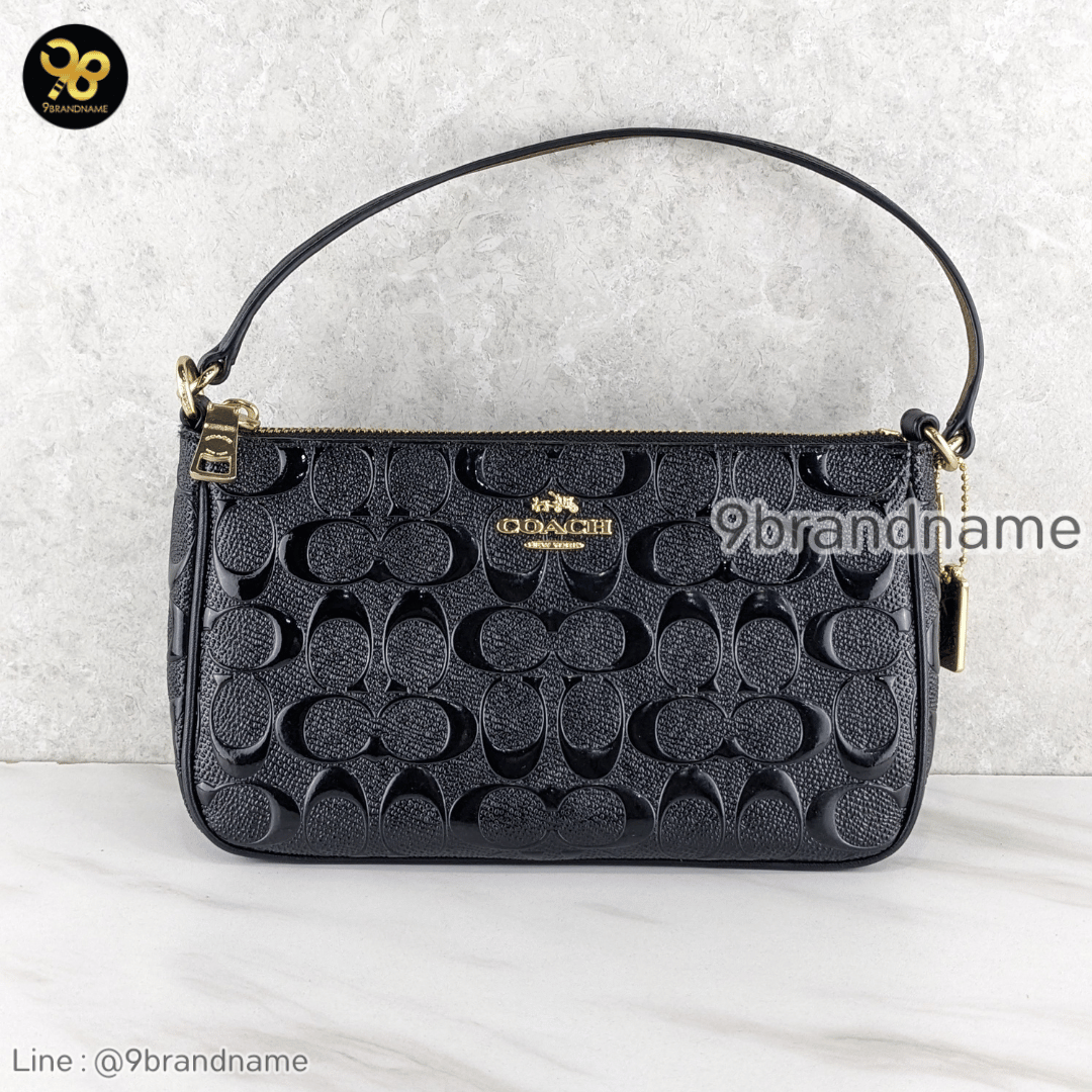 Coach Top handle pouch in signature debossed patent leather