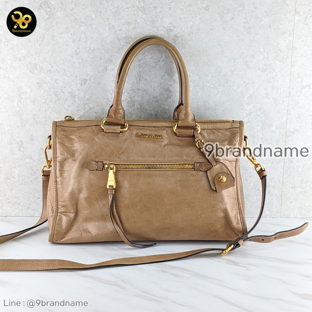 Miu miu	Beige Leather Charm Detail Career Tote Bag