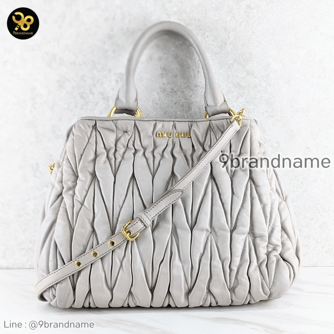 Miu miu Nappa Matelasse Bauletto Top Handle Bowler Pomice	Leather