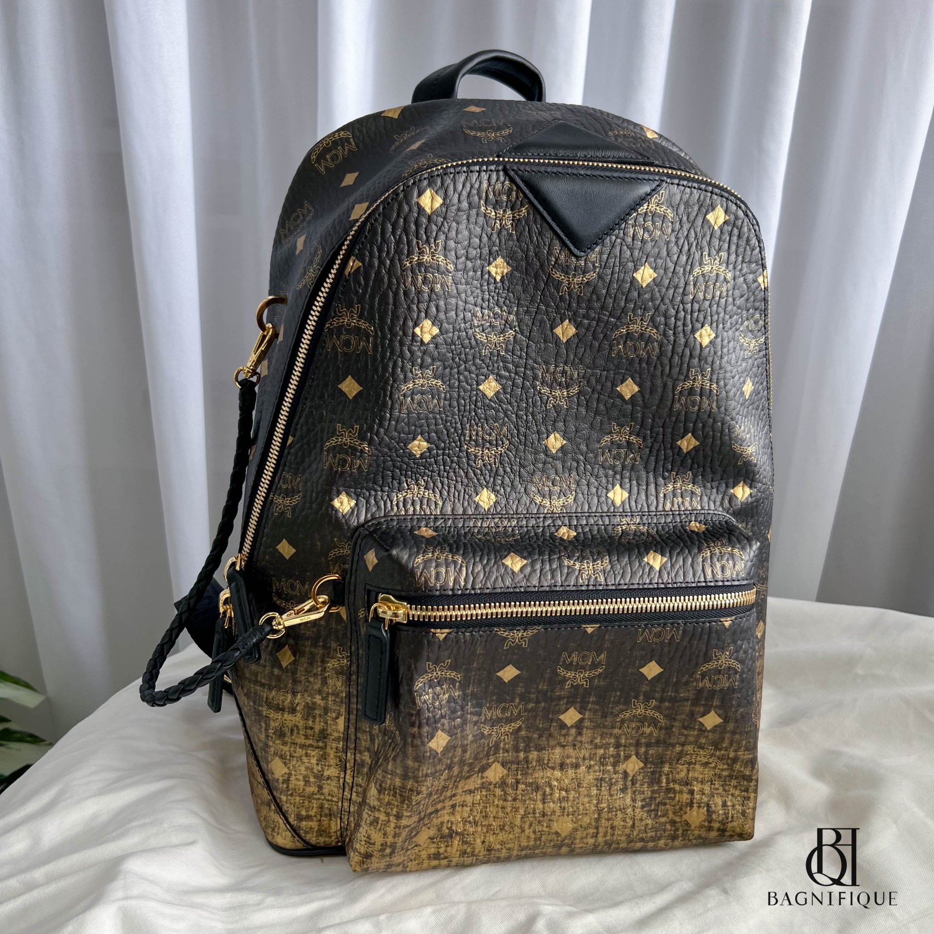 Black and 2024 gold mcm bag