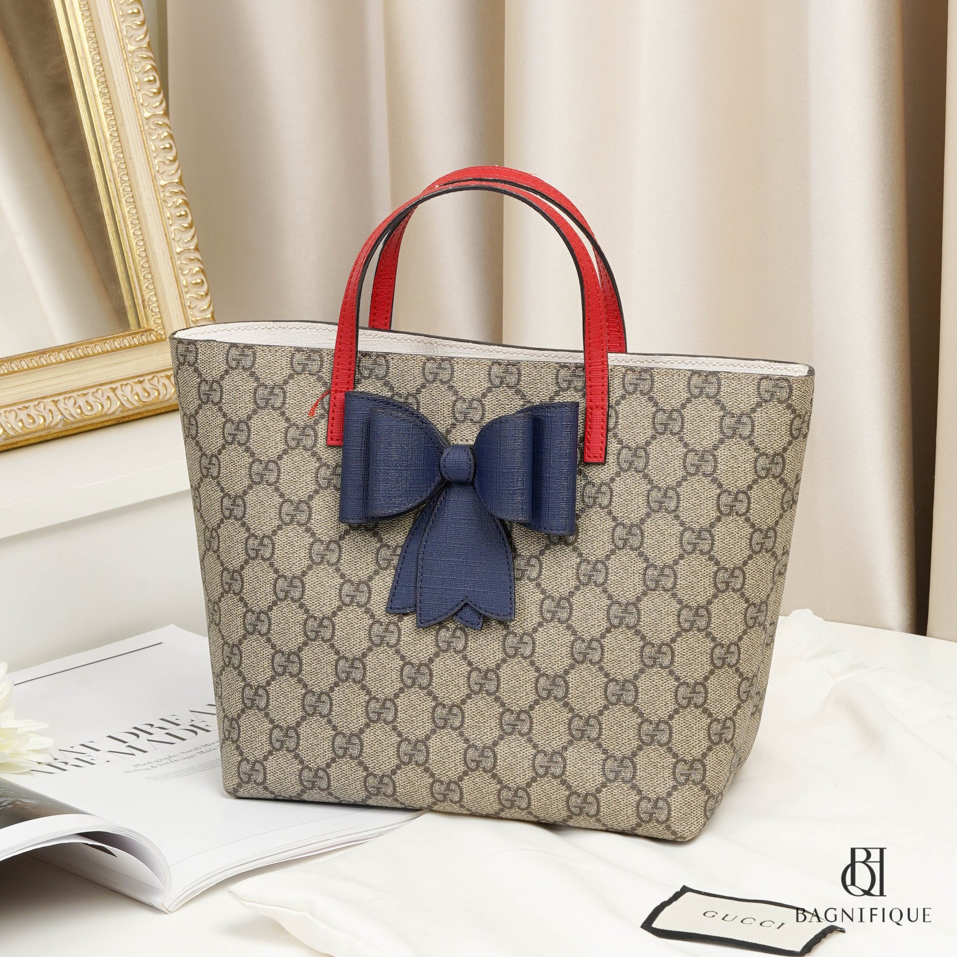 Gucci children's gg supreme bow cheap tote