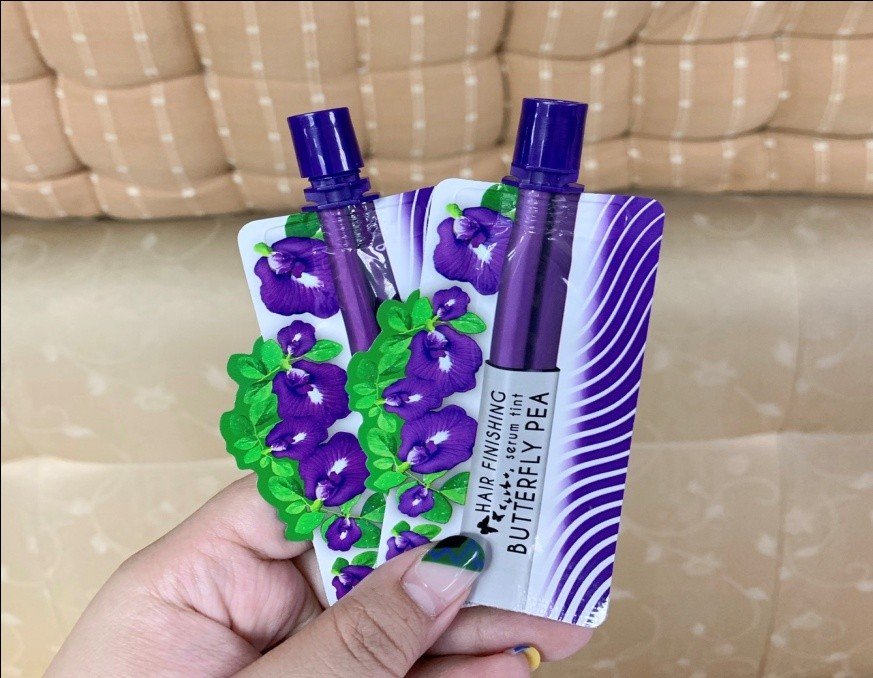 MEIJI BUTTERFLY PEA HAIR SERUM  มาสคาร่าสีใสเก็บไรผม