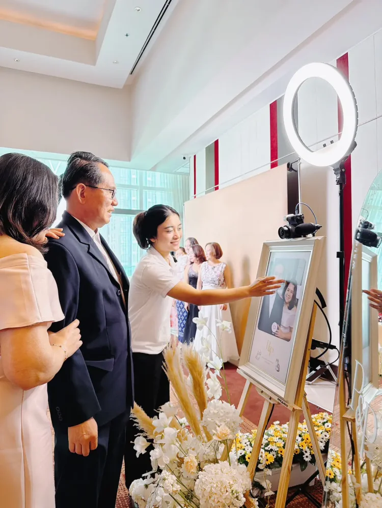 wedding video guestbook service in thailand by rabbit photobooth guests recording video messages for bride and groom