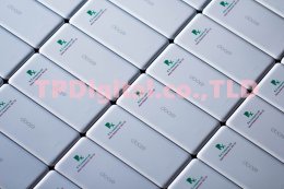 สกรีนโลโก้ลงบน powerbank ลาย R.X. Company Ltd. เนื้อวัสดุเป็นพลาสติกสีขาว