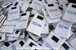 งานพิมพ์โลโก้บนpowerbank สีขาว ลาย Rajamangala university of technology thanyaburi 