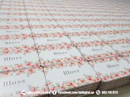 รับสกรีนโลโก้ลงบนพาวเวอร์แบงค์สีขาว ลาย Bloss Natura