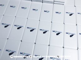 สกรีนโลโก้บนบน Power Bank ลาย MC Station 