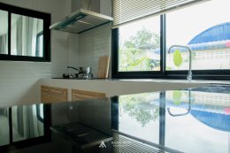 บ้านทรงจั่วผสมปั้นหยาสไตล์โมเดิร์น HB02