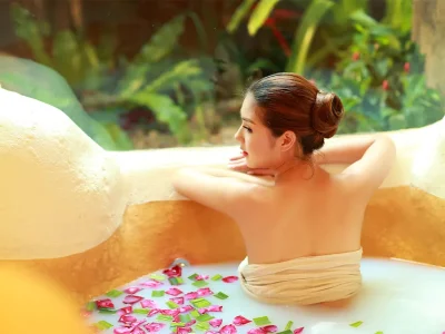 Relaxing hydrotherapy experience with herbal steam and milky bath treatment