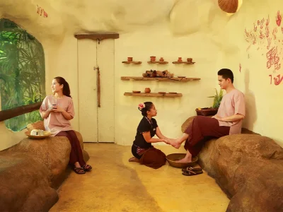 Guest enjoying traditional herbal tea after a relaxing spa treatment at Srimantra Spa Chiang Mai