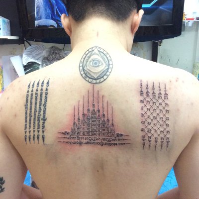 Thai traditional tattoo  sak yant by  bamboo technique 