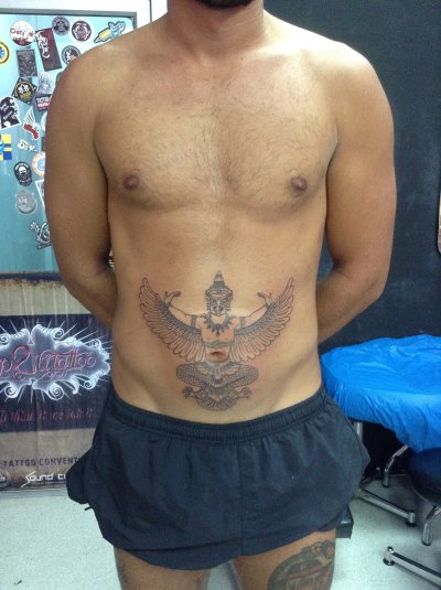 Thai traditional tattoo  sak yant by  bamboo technique 