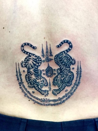 Thai traditional tattoo  sak yant by  bamboo technique 