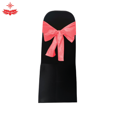 เก้าอี้บุนวมผ้าดำสวมตึง + โบว์สีชมพู