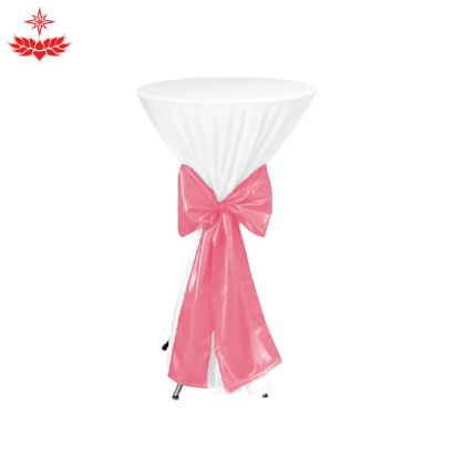 โต๊ะกระจกขาไอเฟล สูง 110 เซนติเมตร คลุมผ้าขาว ผูกโบว์สีชมพู