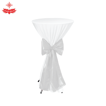 โต๊ะกระจกขาไอเฟล สูง 110 เซนติเมตร คลุมผ้าขาว ผูกโบว์สีเงิน