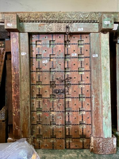Old Wooden Door with Iron and Brass Decor