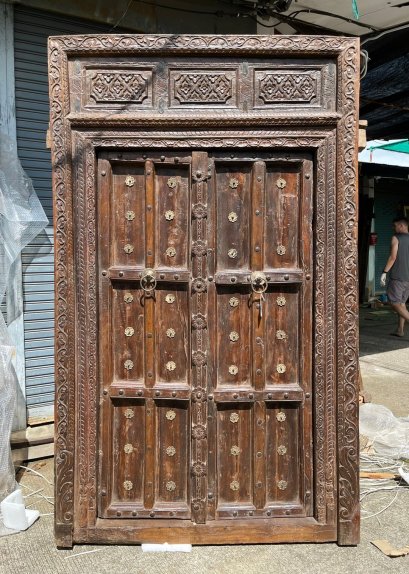 Wooden Door with Brass Flowers