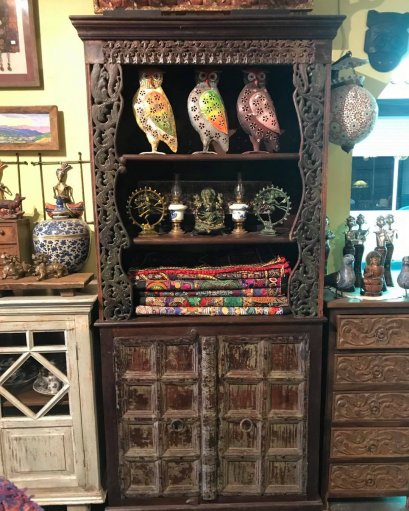 Carved Cabinet with Doors and Shelves