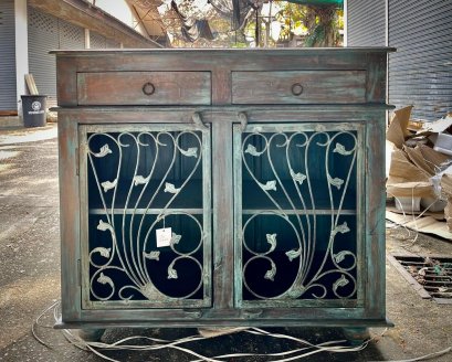 Blue Sideboard with Wrought Iron Decor