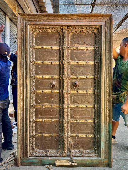 Vintage Door with Brass Decor on Iron Sheets