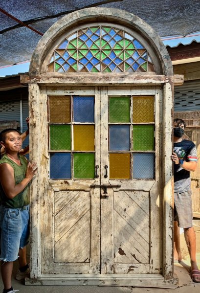 Colorful Arch Door with Colonial Carving