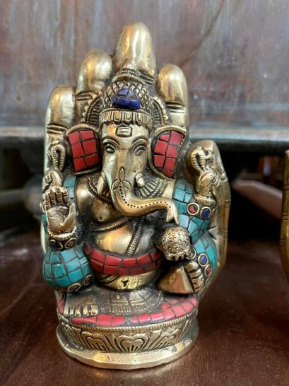 Brass Lord Ganesh Sitting on a Hand
