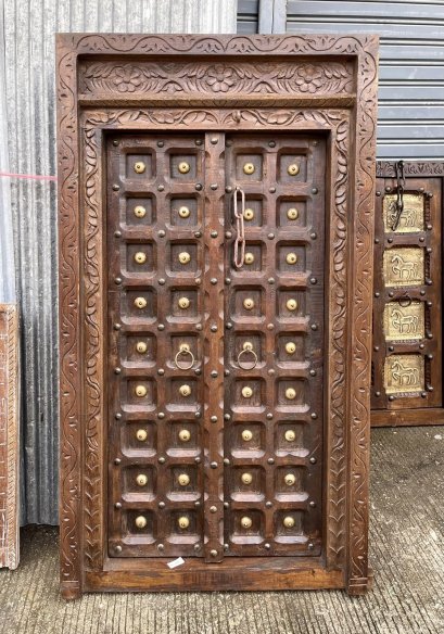 Wooden Window with Carving and Brass Decor