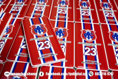 พิมพ์โลโก้ลงบนพาวเวอร์แบงค์ สีขาว ยี่ห้อ Golf  พิมพ์ลาย Asusumtion College Thonburi 23 