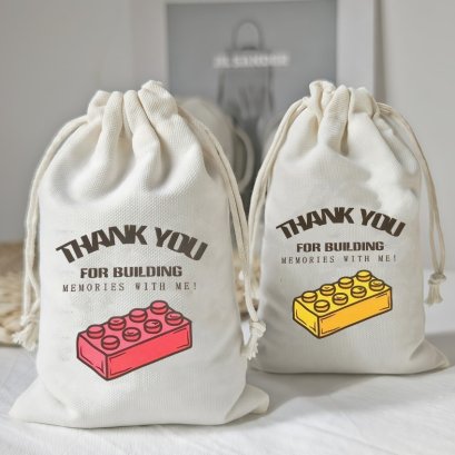 กระเป๋าผ้าดิบหูรูด พิมพ์ายสีสันสดใส  ขนาด 18*13 ซม.