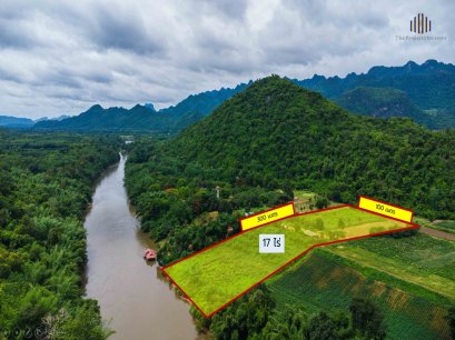 该区域最便宜！投资河畔度假村的机会来了！ 出售土地17莱（6,800平方哇），紧邻Khwae Noi River河，位于北碧府塞育县旺卡拉查，河岸为天然沙滩，地块为长方形，有道路直达，机会难得，速来抢购！ .