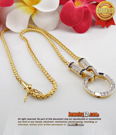 สร้อยคอทอง 96.5 เปอร์เซ็นต์ หัวท้ายฝังเพชรแท้เบลเยี่ยมคัท ประดับไพลินเจียรไน ห่วงเพชรขนาดใหญ่ค่ะ