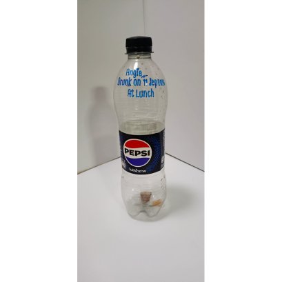 A bottle of Pepsi (Zero Sugar / A Thai label) 550 ml. which I drank on 11 September 2026 for Lunch and has My Signature