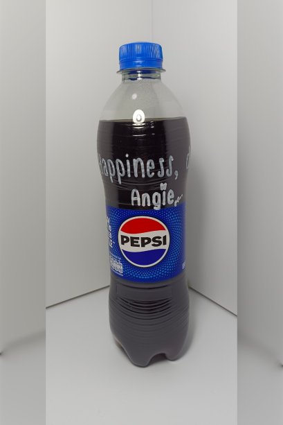 A bottle of Pepsi (Original / A Thai label) 550 ml. which has My Slogan with My Signature