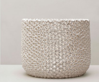 Hand pierced semi oval candle holder