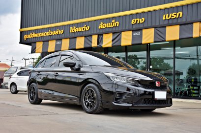 Honda City Hatchback เปลี่ยนล้อแม็ก NK Performance 105N ขนาด 15 นิ้ว พร้อมยาง Bridgestone RE004 และโช้ค Caribbean FinRS ติดตั้งครบที่ Autoquiks ปทุมธานี