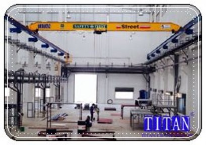 เครเนหนือศีรษะ แบบคานเดี่ยว น้ำหนหักยก 5 ตัน กว้าง 7 เมตร ยกสูง 6.5 เมตร รางวิ่งยาว 48 เมตร