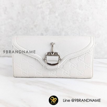 Gucci  Long Wallet Lether White Color  - Used Authentic Bag กระเป๋าตังค์ กุซซี่  ใบยาว สีขาว ทำจากหนังแท้ ปั๊มโลโก้กุซซี่ ด้านหน้าเป็นอะไหล่เงิน สวย ใช้งานง่าย ของแท้มือสอง สภาพดีค่ะ