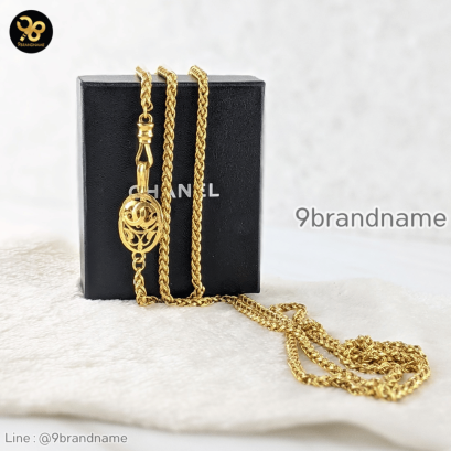 Chanel Chanel gold braid necklace with CC fob. Measures 78″ total.