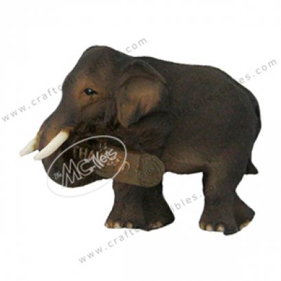 Elephant holding a log