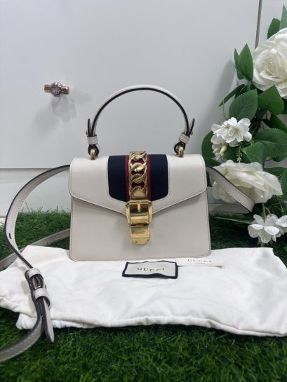 Gucci Sylvie mini bag in white leather.